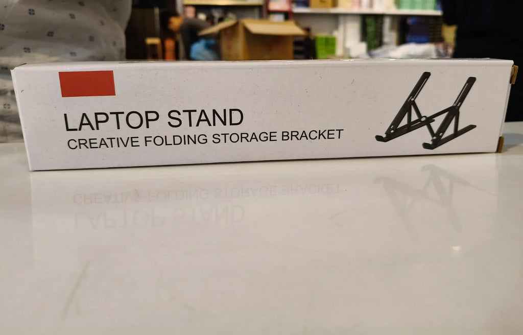 Adjustable Laptop Stand – Creative Folding Portable Storage Bracket for Desk & Office